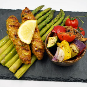 Chicken reshmi kebabs served with med veg and steamed asparagus