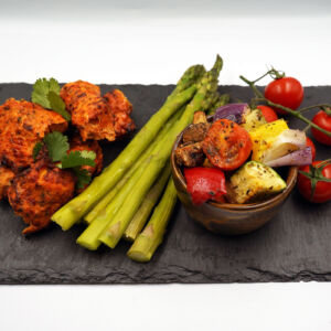 Chicken tikka with steamed asparagus and med veg