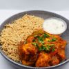 Chicken jalfrezi served with pilau rice and fat free yoghurt raita.