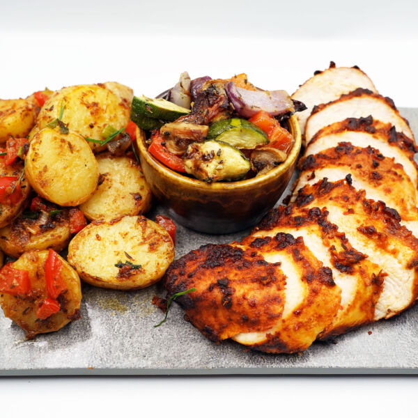 Cajun baby potatoes with grilled peri chicken fillet, med veg and buffalo sauce