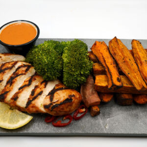Grilled peri fillet with sweet potato wedges and steamed broccoli