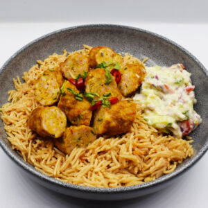 Chicken reshmi kebabs served with Pilau rice and fat free yoghurt raita.