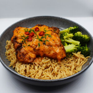 Peri Peri Chicken thighs, served with Pilau rice, steamed broccoli and peri sauce.
