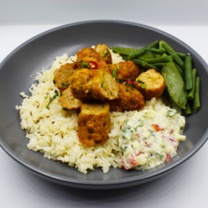 Chicken Reshmi kebabs served with Cauliflower rice and Yoghurt Raita.