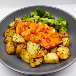 Peri fillet served with roasted garlic and herb baby potatoes and steamed broccoli.