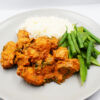 Creamy tuscan chicken served with steamed basmati and steamed greens.