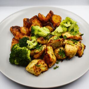 Malai chicken bites served with roasted Cajun baby potatoes and steamed broccoli.