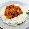King prawn masala served with steamed basmati and yoghurt raita.