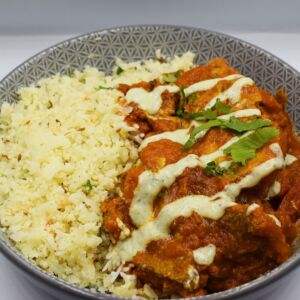 Aloo gosh served with cauliflower rice and mint chutney.